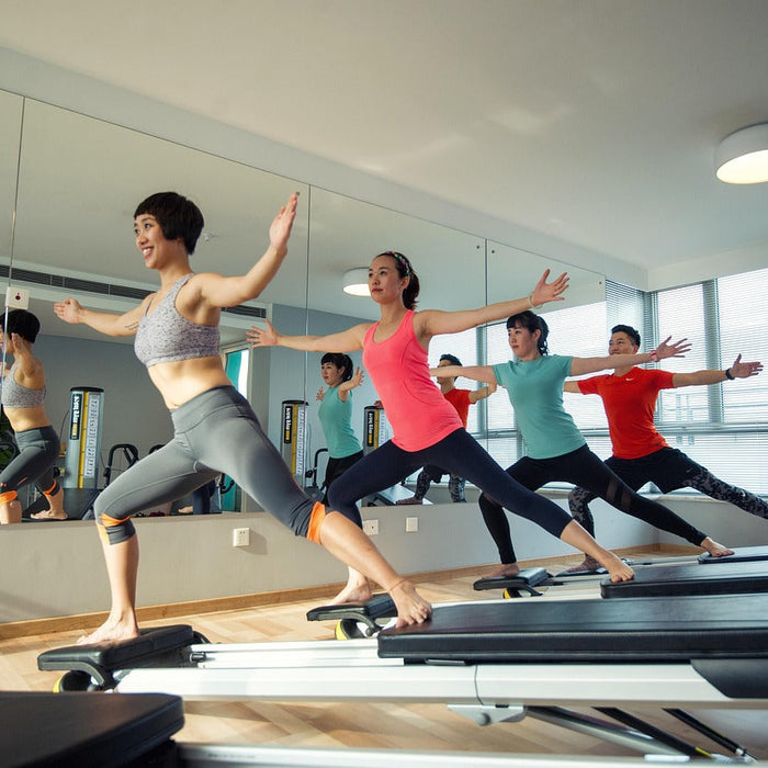 why pilates is good for you group class